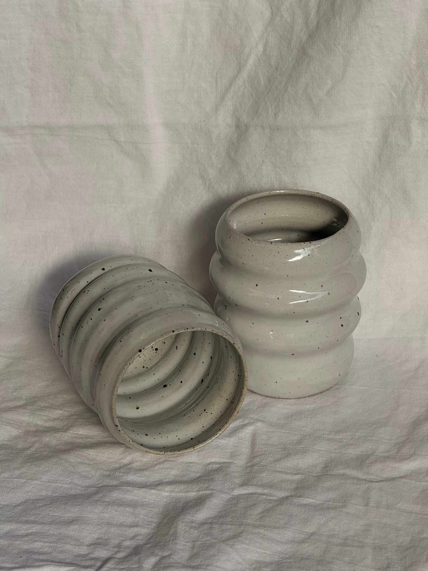 speckled white bubble mugs