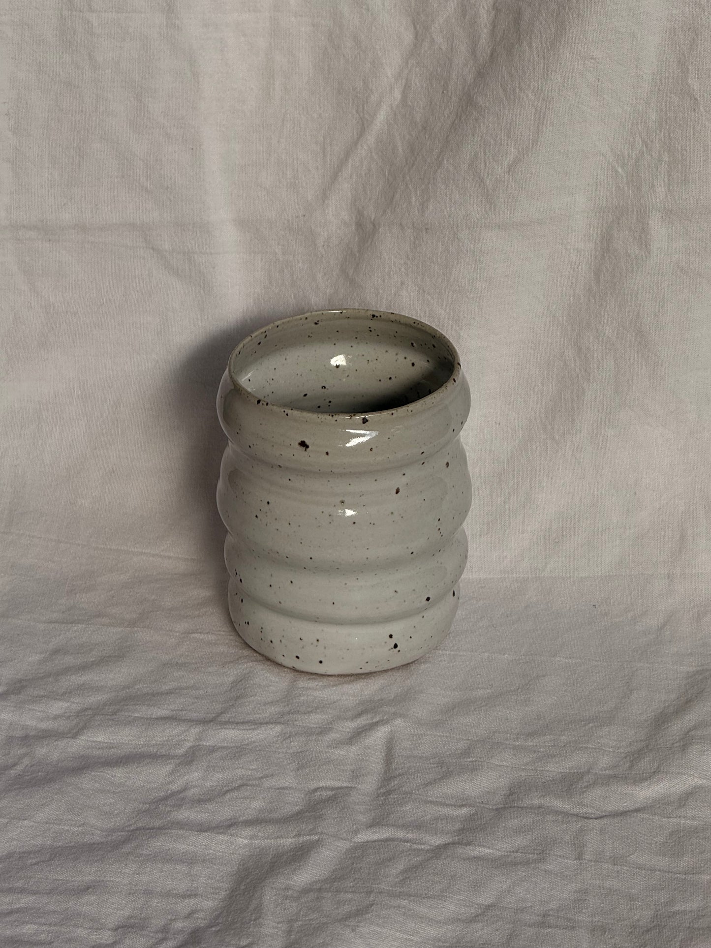 speckled white bubble mugs